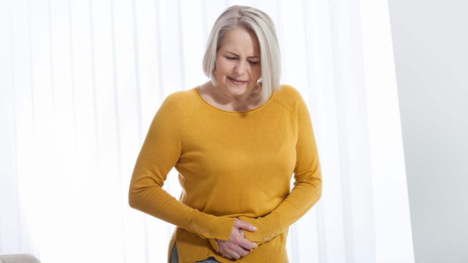 woman in pain from constipation