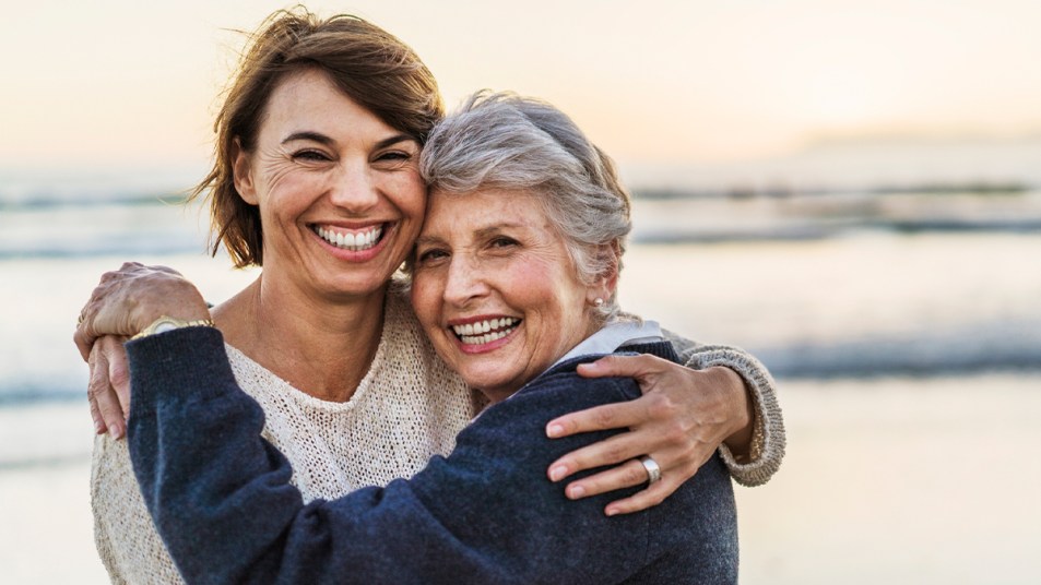 A mother and her daughter hugging each other.jpg